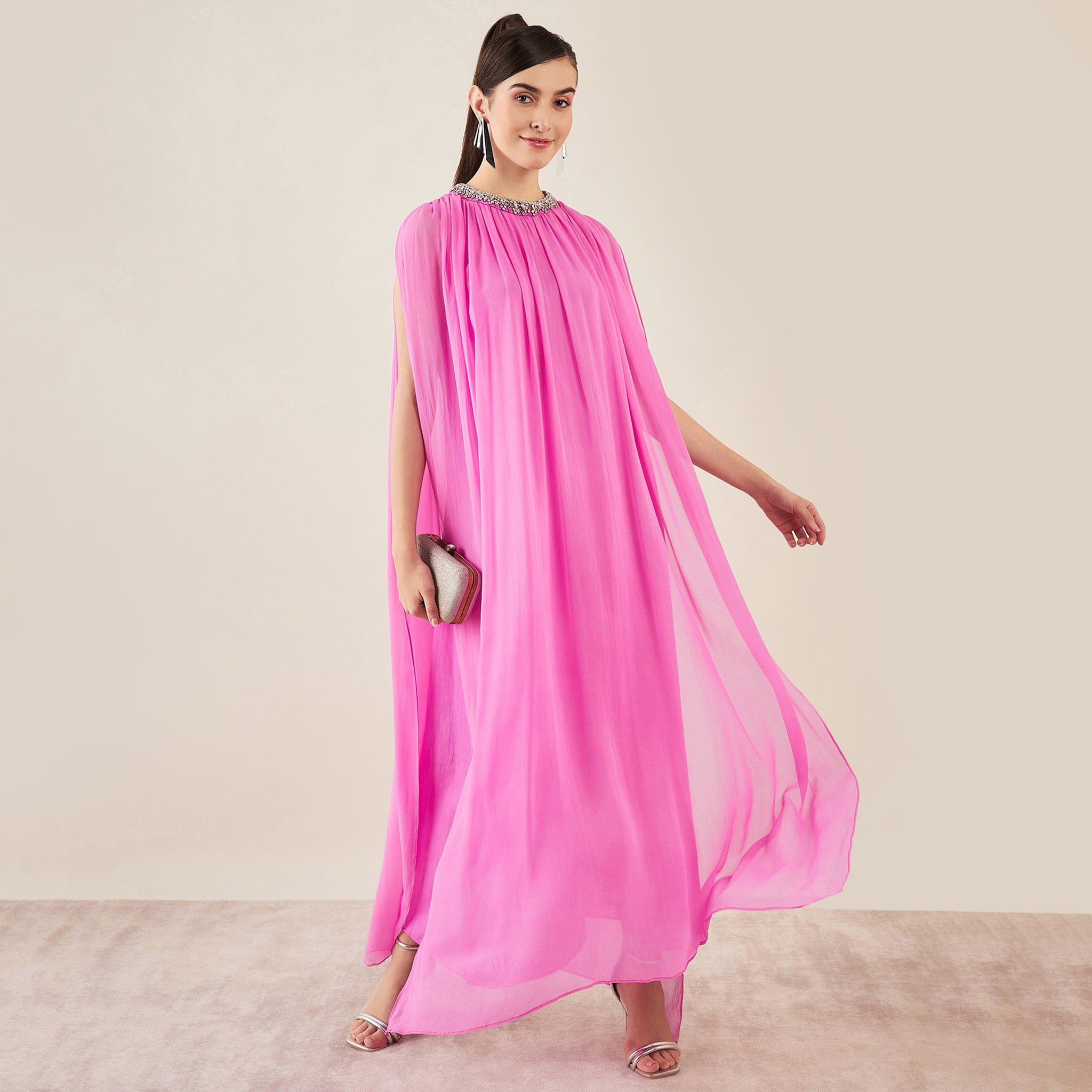 Clothing: Fashion: Dresses. Woman wearing full length dress