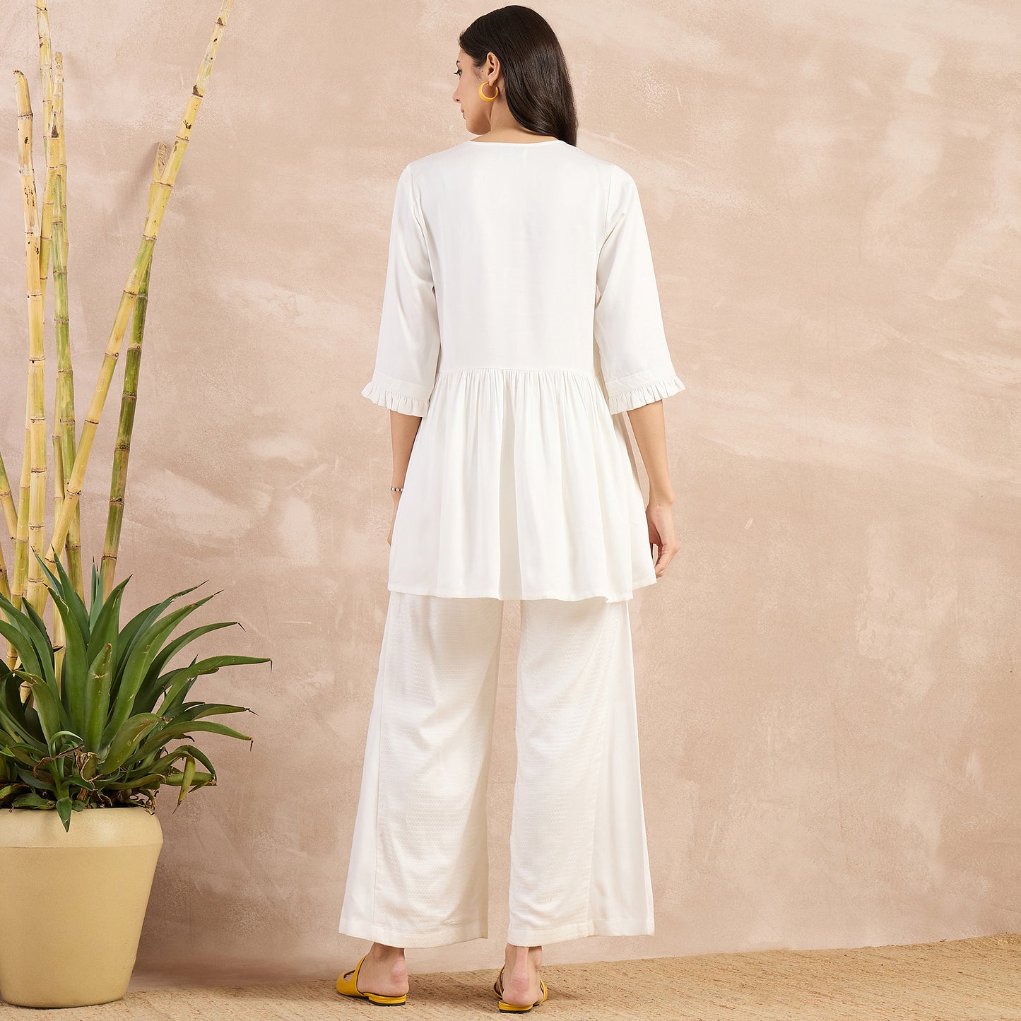 Off-White Herringbone V-Neck Peplum Top and Flared Trouser Set