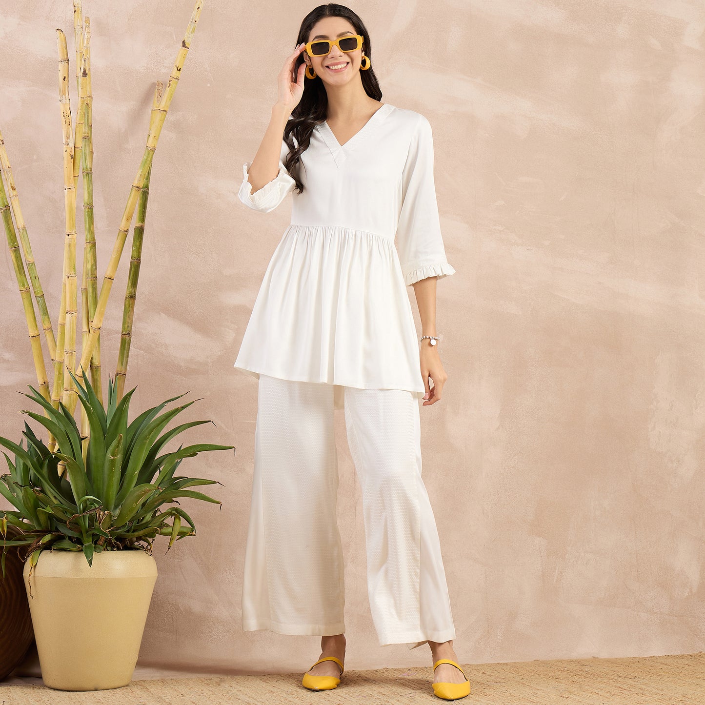 Off-White Herringbone V-Neck Peplum Top and Flared Trouser Set