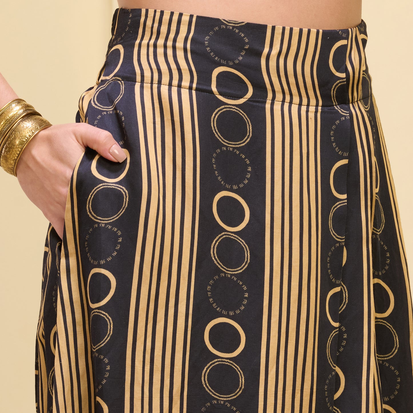 Black and Golden Hand Embroidered Crop Top and Powerful Stripe Print Full Length Skirt with Front Slit Set