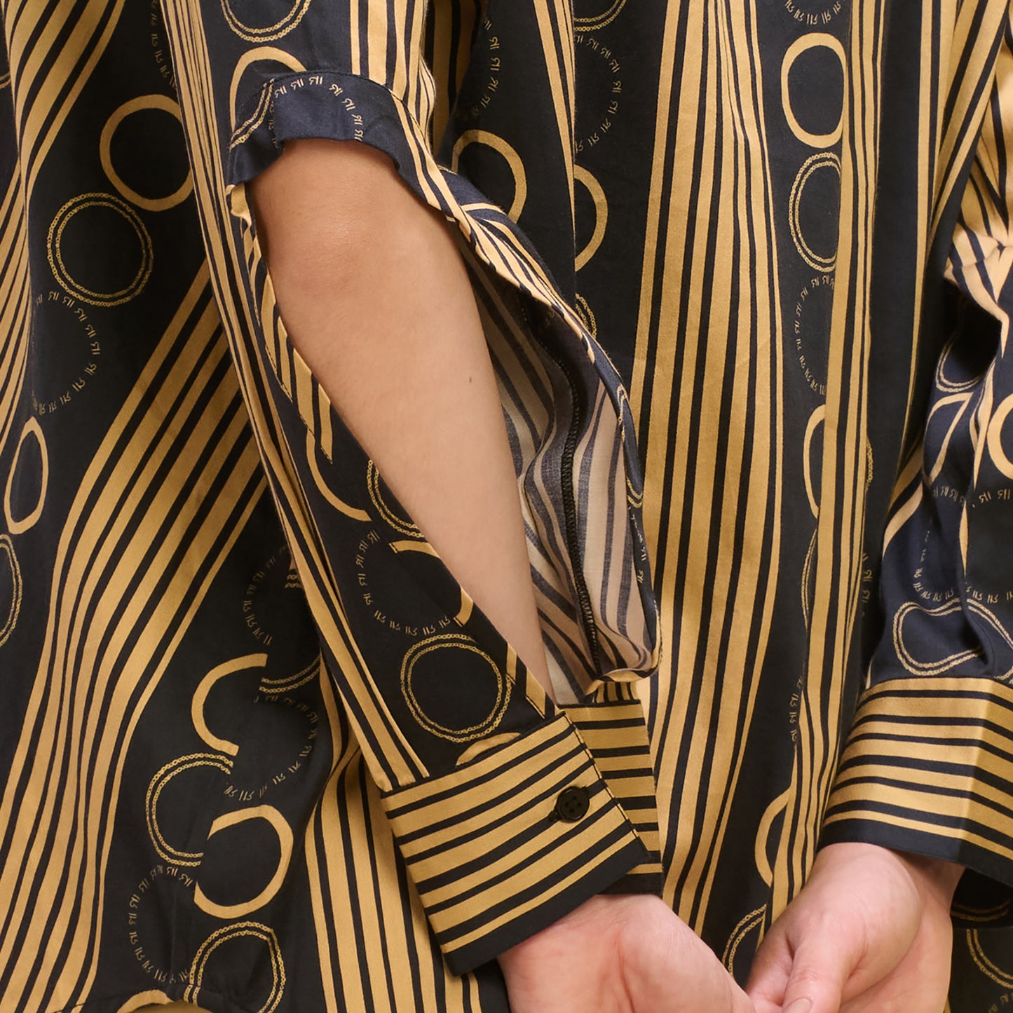 Black and Golden Powerful Stripe Print Shirt with Cutout Sleeves and Folded Hem Straight Trouser Set