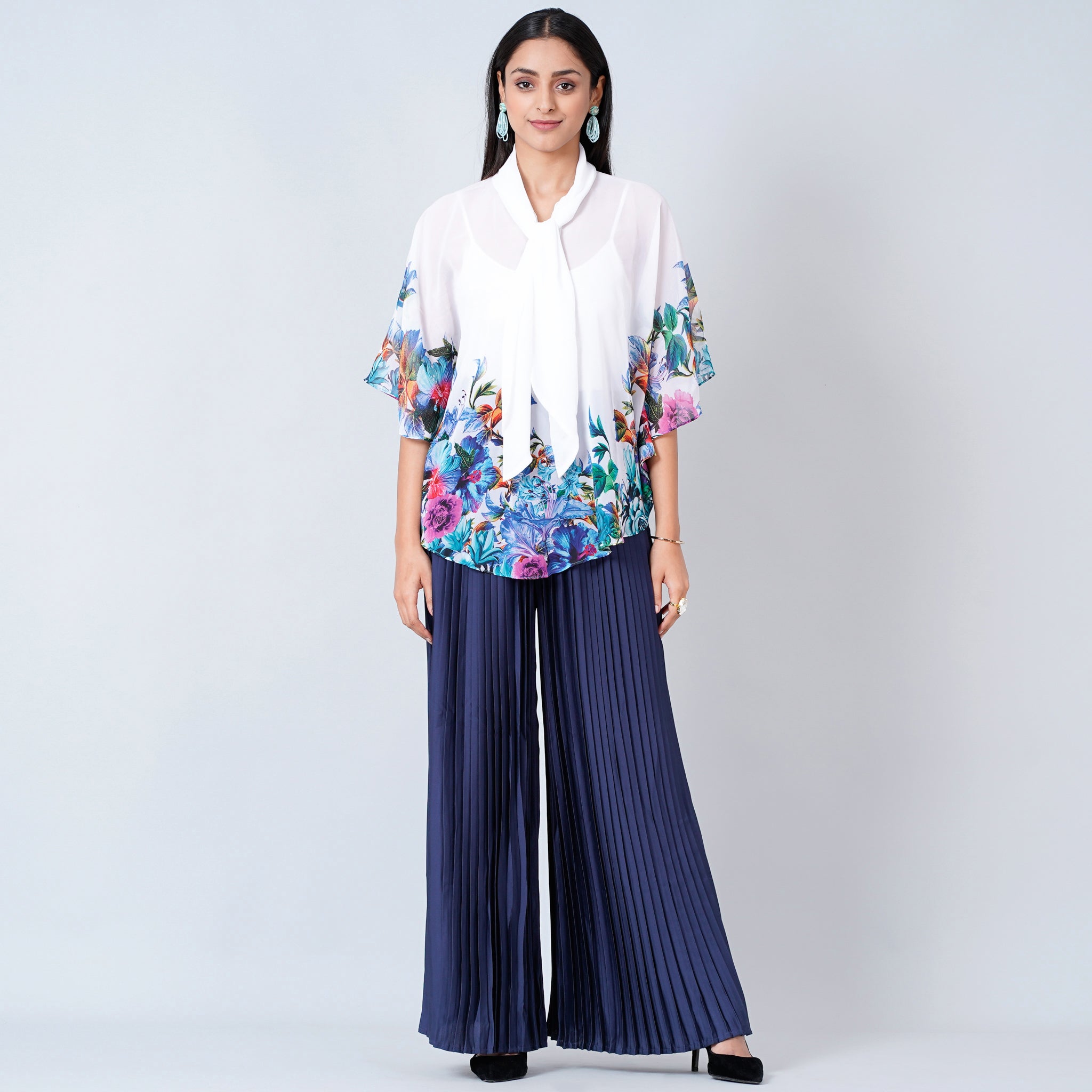 CLASSIC BLUE PALAZZO PRINTED PANT SET WITH A CONTRAST ABLA CROPPED TOP  PAIRED WITH A MATCHING FLOWY PRINTED JACKET AND SHELL TASSELS CATEGORY   Seasons India